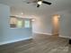 An open living space is filled with natural light from the kitchen, creating an inviting atmosphere for relaxation at 718 Park Ave, Salisbury, NC 28144