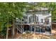 Aerial view of house, deck, and lakefront property at 800 Lakeview Shores Loop, Mooresville, NC 28117