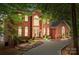 Brick home with a large driveway and landscaping at 800 Lakeview Shores Loop, Mooresville, NC 28117