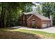 Brick home exterior showcasing landscaping and curb appeal at 800 Lakeview Shores Loop, Mooresville, NC 28117