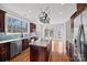 Kitchen with island, stainless steel appliances, and lake view at 800 Lakeview Shores Loop, Mooresville, NC 28117