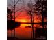 Stunning sunset over the lake, reflecting vibrant colors at 800 Lakeview Shores Loop, Mooresville, NC 28117