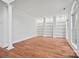 Bright living room with hardwood floors and built-in shelves at 800 Lakeview Shores Loop, Mooresville, NC 28117