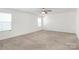 Cozy bedroom with neutral walls, plush carpet, and light from multiple windows at 980 Von Buren Blvd, Rock Hill, SC 29730