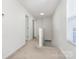 Bright hallway with plush carpet, leading to other rooms and stairway at 980 Von Buren Blvd, Rock Hill, SC 29730