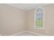 Simple bedroom with a window and neutral paint, providing a blank slate at 180 Sink Farm Rd, Mooresville, NC 28115