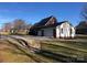 View of the attached three-car garage, showcasing the home's spacious parking accommodations at 180 Sink Farm Rd, Mooresville, NC 28115
