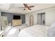 Spacious main bedroom with accent wall, dresser with tv, and neutral carpet at 180 Sink Farm Rd, Mooresville, NC 28115