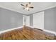 Bright bedroom featuring hardwood floors, neutral walls, and a ceiling fan at 306 S Jones Ave, Rock Hill, SC 29730