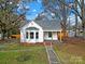Charming single-story home featuring a well-maintained lawn and inviting curb appeal at 306 S Jones Ave, Rock Hill, SC 29730