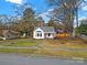 Renovated white house with a walkway, yard, and street view at 306 S Jones Ave, Rock Hill, SC 29730