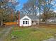 Charming renovated white house with a walkway and yard at 306 S Jones Ave, Rock Hill, SC 29730