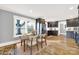 Modern kitchen with dark cabinetry, stainless steel appliances, and hardwood floors at 306 S Jones Ave, Rock Hill, SC 29730