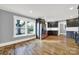 Updated kitchen, stainless steel fridge, hardwood floors at 306 S Jones Ave, Rock Hill, SC 29730