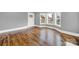 Hardwood floors and bay window in this living room at 306 S Jones Ave, Rock Hill, SC 29730