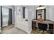 Bright bathroom featuring a soaking tub with decorative artwork and vanity with framed mirror at 3798 Red Doc Rd, Lancaster, SC 29720