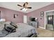 Bedroom includes ceiling fan, dresser, and closet access at 3798 Red Doc Rd, Lancaster, SC 29720