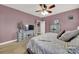 Bedroom featuring a ceiling fan, dresser, and serene color scheme at 3798 Red Doc Rd, Lancaster, SC 29720