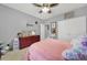 Bright bedroom featuring a cozy bed, dresser, ceiling fan and ample closet space at 3798 Red Doc Rd, Lancaster, SC 29720