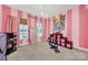 Bright pink bedroom with natural light, striped walls, and plenty of storage at 3798 Red Doc Rd, Lancaster, SC 29720