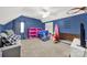 Colorful playroom or bedroom space with fun design elements and carpeted flooring at 3798 Red Doc Rd, Lancaster, SC 29720