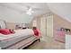 Cozy bedroom with neutral carpet, ceiling fan and adjacent closet storage at 3798 Red Doc Rd, Lancaster, SC 29720