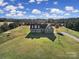 Charming two-story home with landscaped yard and gravel driveway at 3798 Red Doc Rd, Lancaster, SC 29720