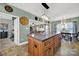 Kitchen view with a large center island, adjacent dining area, and open layout at 3798 Red Doc Rd, Lancaster, SC 29720