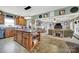 Open-concept kitchen featuring a large island, seamlessly connecting to the living room at 3798 Red Doc Rd, Lancaster, SC 29720