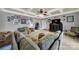 Comfortable living room with plush sectional sofa, ceiling fan and coffered ceilings at 3798 Red Doc Rd, Lancaster, SC 29720