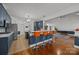 Modern kitchen featuring blue cabinets, stainless steel appliances, and bar seating at 4687 Snow Dr, Harrisburg, NC 28075