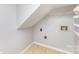 A practical laundry area featuring a utility sink hookups and built-in shelving at 5328 Caradon Dr, Charlotte, NC 28227