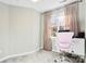 Bedroom featuring neutral paint, gray carpet, and a small desk at 7108 Founders Club Ct, Charlotte, NC 28269