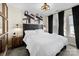 Bright bedroom with decorative lighting, neutral color palette, and modern decor at 7108 Founders Club Ct, Charlotte, NC 28269
