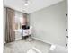 Bedroom featuring neutral paint, gray carpet, and a small desk at 7108 Founders Club Ct, Charlotte, NC 28269