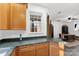Bright kitchen showcases modern cabinets and a view of the adjacent dining area through a window at 7108 Founders Club Ct, Charlotte, NC 28269
