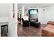 Modern living room featuring a cozy fireplace, sleek furniture, and stylish decor at 7108 Founders Club Ct, Charlotte, NC 28269