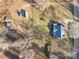 Aerial view showing home, RV, and surrounding land at 10310 Stokes Ferry Rd, Gold Hill, NC 28071