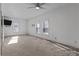 Spacious bedroom with carpet and two windows at 10310 Stokes Ferry Rd, Gold Hill, NC 28071