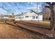 Side view of the house showcasing the siding and windows at 10310 Stokes Ferry Rd, Gold Hill, NC 28071