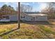 Ranch style home with metal roof and large backyard at 10310 Stokes Ferry Rd, Gold Hill, NC 28071