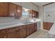 Kitchen with wood cabinets and white countertops at 10310 Stokes Ferry Rd, Gold Hill, NC 28071