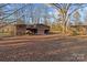 Old wooden outbuilding on the property at 10310 Stokes Ferry Rd, Gold Hill, NC 28071