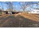 Two rustic outbuildings situated on a grassy lot at 10310 Stokes Ferry Rd, Gold Hill, NC 28071