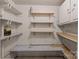 Spacious pantry with ample shelving for storage at 10310 Stokes Ferry Rd, Gold Hill, NC 28071