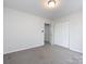 Bright bedroom features carpet and double door closet at 11813 Fox Glen Rd, Charlotte, NC 28269