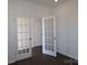 Office space with glass french doors at 2612 Clipper Nw Ct, Concord, NC 28027