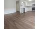 View of dining area and updated kitchen with new flooring at 2623 Trumpet Ct, Fort Mill, SC 29715