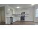 Modern kitchen with stainless steel appliances and granite countertops at 2623 Trumpet Ct, Fort Mill, SC 29715