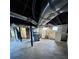 Unfinished basement area with concrete floors at 325 Hunter St, Salisbury, NC 28144